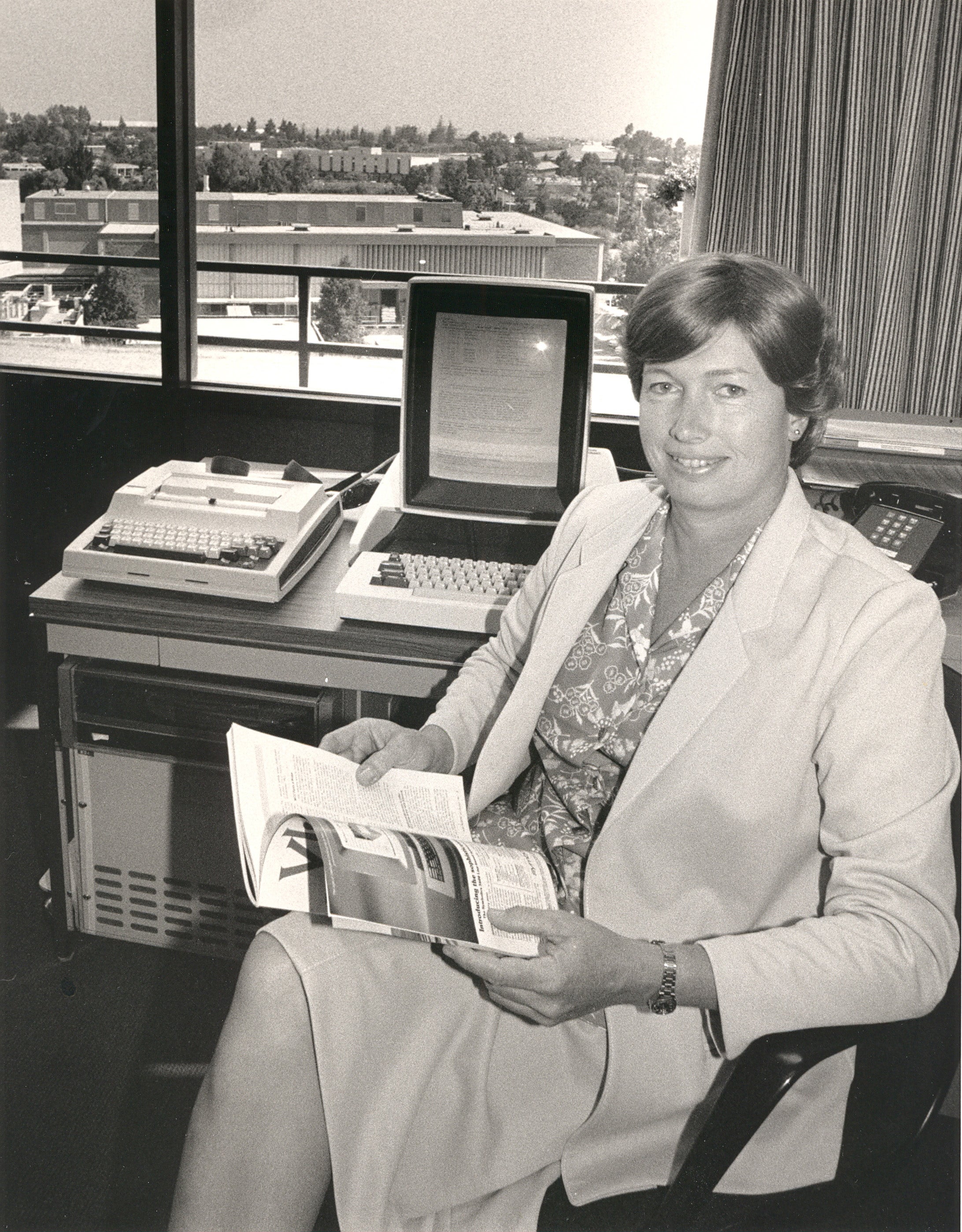 Conway sitting beside her Xerox Alto, an early personal computer developed at at Xerox’s PARC research lab where she worked